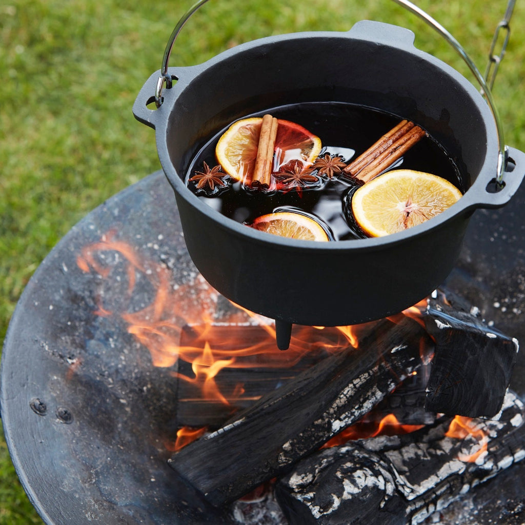 Mulled wine prepared over a wood fire