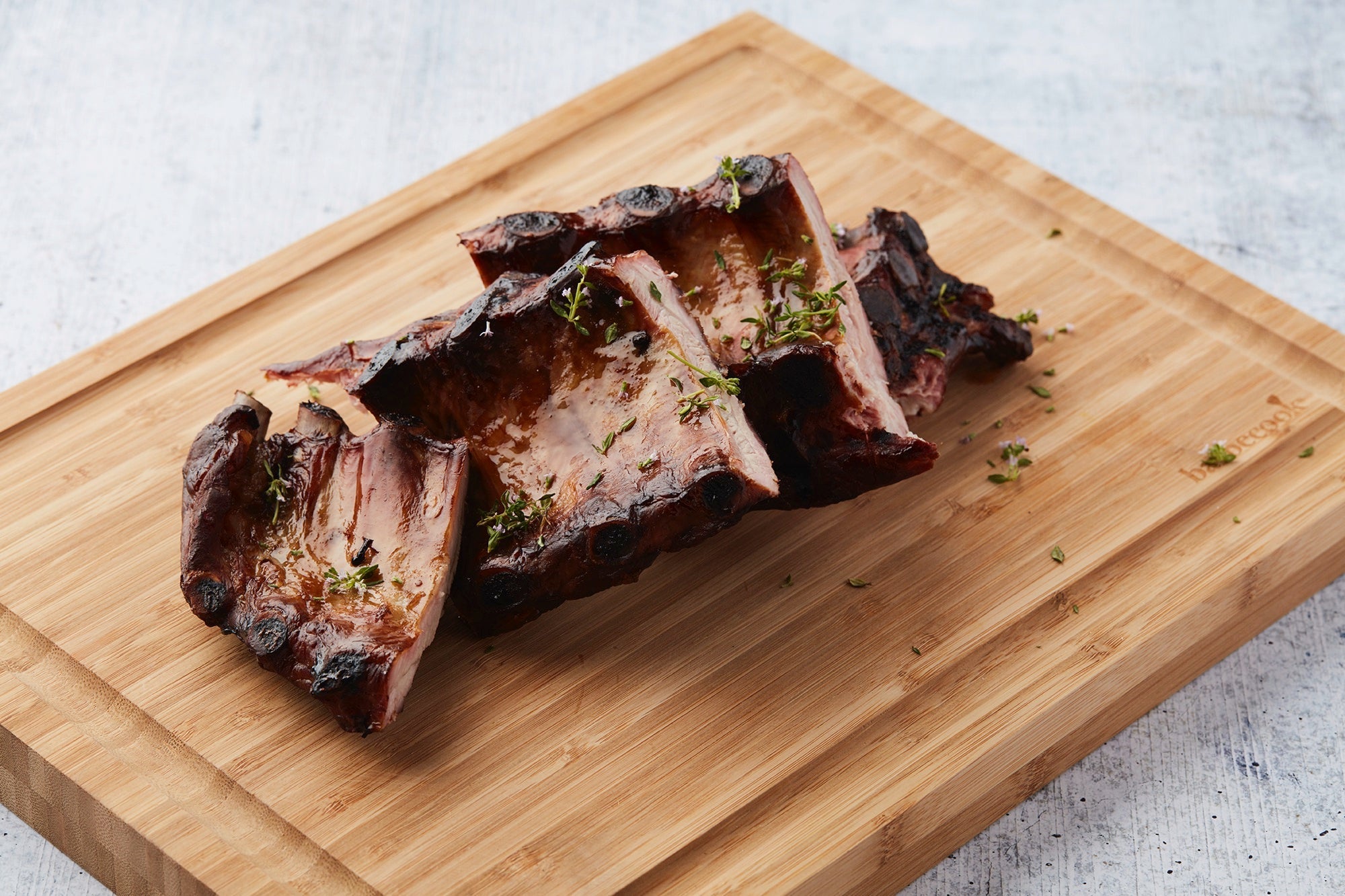 Sweet apricot spare ribs in the BBQ smoker